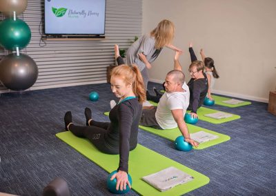 Group Mat Pilates Class Instruction